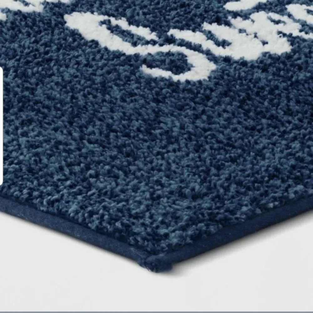Threshold bath rug